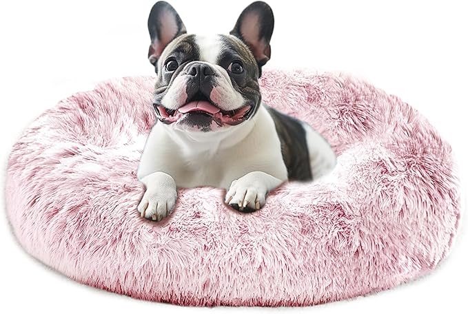 JOLLYVOGUE Medium Calming Dog Bed, Anti-Anxiety Donut Cuddler Cat Bed with Anti-Slip Bottom, Fluffy Faux Fur Machine Washable Pet Cushion for Medium Dog & Cat, 27"/Smoke Pink