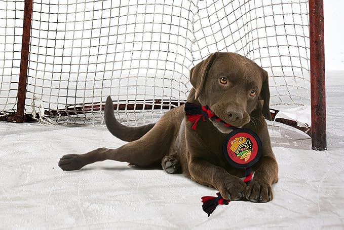 Pets First Rubber Dog Toy - Heavy-Duty Rope Tug with NHL Chicago Blackhawks Puck. Play Hockey with Your Pet!